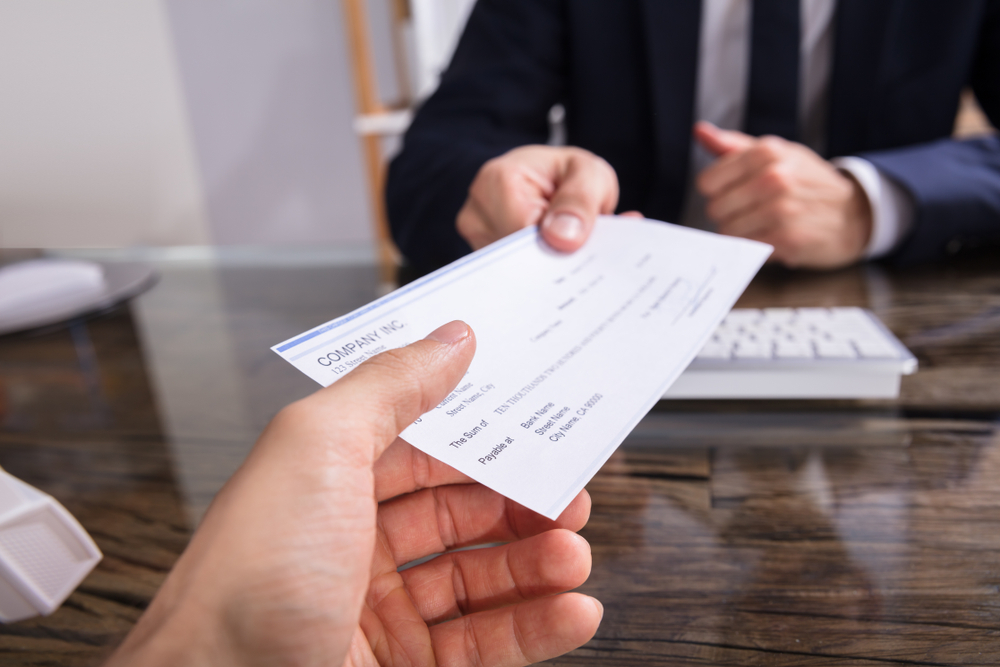 A person receiving cheque on account of road rash injury compensation