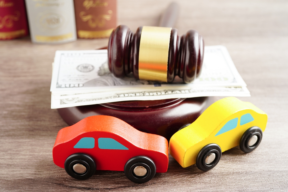 Car accident attorney advising a client after a head-on collision, emphasizing the importance of legal guidance